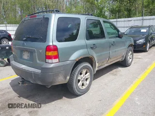 2006 Ford Escape XLT with VIN 1FMYU931X6KC71723, listed as a IAAI auction lot 42253154 with 148,959 mi miles and . Bid and sale history available at DreamBid. Image 4.