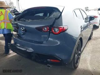 2024 Mazda Mazda3 Hatchback 2.5 S Carbon Edition with VIN JM1BPBLMXR1652534, listed as a IAAI auction lot 41681502 with 17,266 mi miles. Bid and sale history available at carsss.com. Image 4.