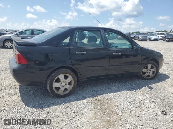2006 Ford Focus S with VIN 1FAFP34N76W246035, listed as a Copart auction lot 61985015 with 196,498 mi miles and Salvage title. Bid and sale history available at DreamBid. Image 3.