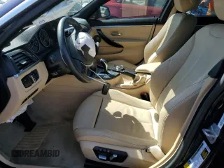 2016 BMW 4 Series 428i xDrive z VIN WBA4C9C55GG140032, wystawiony jako Copart lot #57702215 z przebiegiem 57 050 mil mil oraz Szkoda całkowita • Salvage title. Historia ofert i sprzedaży dostępna na DreamBid. Obrazek 7.