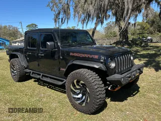 2023 Jeep Gladiator Mojave with VIN 1C6JJTEG1PL516103, listed as a Copart auction lot 48534005 with 24,218 mi miles and Salvage Title. Bid and sale history available at carsss.com. Image 1.