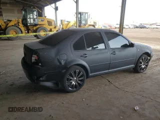 1999 Volkswagen Jetta GL z VIN 3VWRA29M7XM058584, wystawiony jako Copart lot #83714754 z przebiegiem 398 647 mil mil oraz Szkoda całkowita • Salvage title. Historia ofert i sprzedaży dostępna na DreamBid. Obrazek 3.