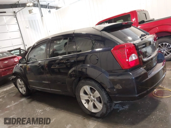 2011 Dodge Caliber Mainstreet with VIN 1B3CB3HA2BD148279, listed as a IAAI auction lot 42150488 with 131,278 mi miles and . Bid and sale history available at DreamBid. Image 14.