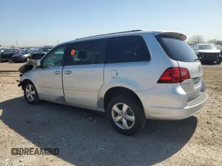 2011 Volkswagen Routan SE with VIN 2V4RW3DG0BR621820, listed as a Copart auction lot 87670825 with 180,222 mi miles and Salvage title. Bid and sale history available at DreamBid. Image 2.