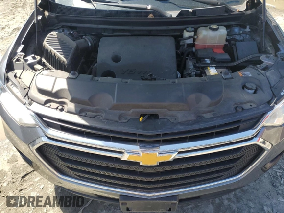 2018 Chevrolet Traverse LS with VIN 1GNERFKW9JJ276499, listed as a Copart auction lot 56007095 with 69,202 mi miles and Salvage title. Bid and sale history available at DreamBid. Image 12.