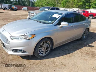 2014 Ford Fusion SE with VIN 3FA6P0HD9ER231067, listed as a IAAI auction lot 41946109 with 265,233 mi miles. Bid and sale history available at carsss.com. Image 2.