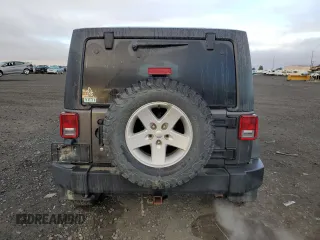 2018 Jeep Wrangler JK Unlimited Sport S with VIN 1C4BJWDG7JL814744, listed as a Copart auction lot 77830714 with 130,229 mi miles and Salvage Title. Bid and sale history available at carsss.com. Image 6.