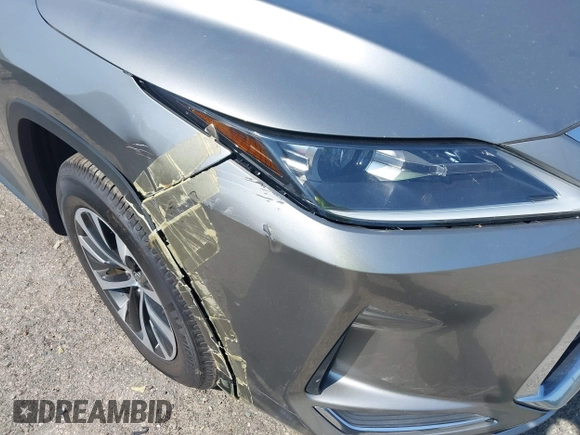 2021 Lexus RX 350 with VIN 2T2AZMAA3MC186617, listed as a IAAI auction lot 42226167 with 133,435 mi miles and . Bid and sale history available at DreamBid. Image 19.