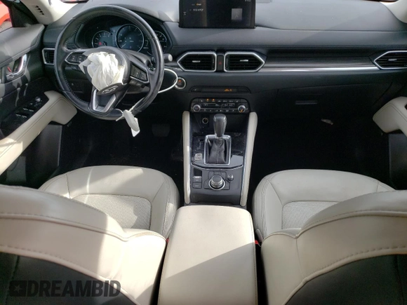 2021 Mazda CX-5 Grand Touring Reserve with VIN JM3KFBAY4M0358478, listed as a Copart auction lot 50839815 with 84,932 mi miles and Salvage Title. Bid and sale history available at DreamBid. Image 8.