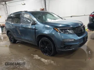 2021 Honda Pilot Special Edition z VIN 5FNYF6H22MB089099, wystawiony jako IAAI lot #41395650 z przebiegiem 25 260 mil mil oraz . Historia ofert i sprzedaży dostępna na DreamBid. Obrazek 1.