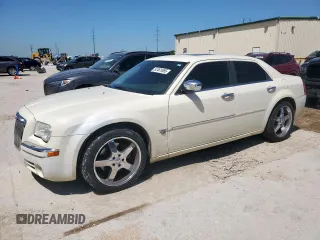2006 Chrysler 300 C z VIN 2C3LA63H86H289684, wystawiony jako Copart lot #52461065 z przebiegiem 219 955 mil mil oraz Czysty tytuł • Clean title. Historia ofert i sprzedaży dostępna na DreamBid. Obrazek 1.