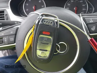 2015 Audi A6 Premium Plus z VIN WAUGFAFC8FN032627, wystawiony jako IAAI lot #41270302 z przebiegiem 82 104 mil mil oraz . Historia ofert i sprzedaży dostępna na DreamBid. Obrazek 11.