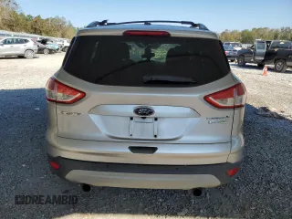 2013 Ford Escape Titanium с VIN 1FMCU0J96DUB25142, выставлен на аукционе Copart как лот 75759094 с пробегом 167 809 миль миль и Списание • Salvage title. История ставок и продаж доступна на DreamBid. Изображение 6.