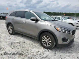 2018 Kia Sorento LX z VIN 5XYPG4A31JG406679, wystawiony jako Copart lot #55087315 z przebiegiem 146 171 mil mil oraz Szkoda całkowita • Salvage title. Historia ofert i sprzedaży dostępna na DreamBid. Obrazek 4.
