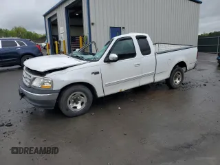 1999 Ford F-150 with VIN 1FTZX1724XNA39395, listed as a Copart auction lot 55562765 with Not provided miles and Salvage title. Bid and sale history available at DreamBid. Image 1.