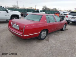 1999 Cadillac DeVille with VIN 1G6KD54Y7XU763262, listed as a IAAI auction lot 41490435 with 200,186 mi miles. Bid and sale history available at carsss.com. Image 4.