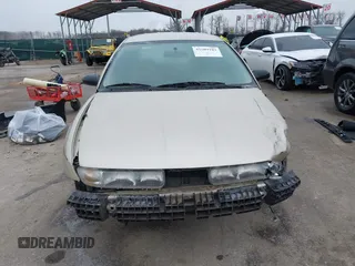 1997 Saturn SW z VIN 1G8ZK8270VZ205793, wystawiony jako IAAI lot #41609103 z przebiegiem 120 754 mil mil oraz . Historia ofert i sprzedaży dostępna na DreamBid. Obrazek 13.