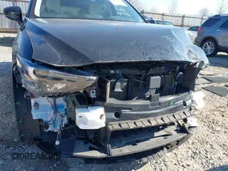 2021 Mazda CX-5 Grand Touring with VIN JM3KFBDM0M0468081, listed as a IAAI auction lot 41894411 with 54,664 mi miles. Bid and sale history available at carsss.com. Image 6.