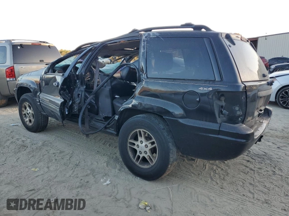 1999 Jeep Grand Cherokee Limited with VIN 1J4GW68S7XC676809, listed as a Copart auction lot 79059944 with 196,391 mi miles and Salvage Title. Bid and sale history available at carsss.com. Image 2.