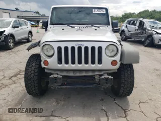 2012 Jeep Wrangler Sport z VIN 1C4AJWAG4CL185009, wystawiony jako Copart lot #61203395 z przebiegiem 93 534 mil mil oraz Szkoda całkowita • Salvage title. Historia ofert i sprzedaży dostępna na DreamBid. Obrazek 5.