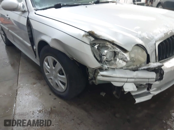 2002 Hyundai Sonata with VIN KMHWF25S42A574561, listed as a IAAI auction lot 41613838 with 141,808 mi miles. Bid and sale history available at carsss.com. Image 6.