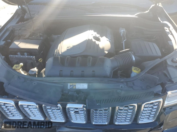 2017 Jeep Grand Cherokee Overland with VIN 1C4RJFCT7HC684746, listed as a Copart auction lot 83259314 with 106,848 mi miles and Salvage Title. Bid and sale history available at carsss.com. Image 14.
