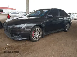 2013 Mitsubishi Lancer Evolution GSR with VIN JA32W8FV6DU009257, listed as a IAAI auction lot 41917942 with 125,279 mi miles. Bid and sale history available at carsss.com. Image 17.