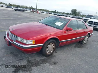 1995 Cadillac Seville Luxury SLS with VIN 1G6KS52Y7SU833943, listed as a IAAI auction lot 40873559 with 1 mi miles. Bid and sale history available at carsss.com. Image 2.