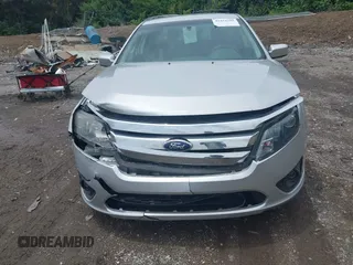 2012 Ford Fusion SE z VIN 3FAHP0HA3CR421636, wystawiony jako IAAI lot #42454385 z przebiegiem 138 282 mil mil oraz . Historia ofert i sprzedaży dostępna na DreamBid. Obrazek 6.