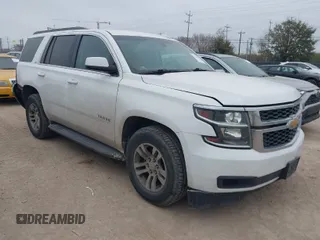 2015 Chevrolet Tahoe LS with VIN 1GNSCAEC2FR641252, listed as a IAAI auction lot 41528667 with 183,796 mi miles and . Bid and sale history available at DreamBid. Image 1.