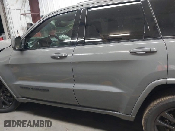 2020 Jeep Grand Cherokee Altitude z VIN 1C4RJFAG0LC163818, wystawiony jako IAAI lot #42009857 z przebiegiem 77 843 mil mil oraz . Historia ofert i sprzedaży dostępna na DreamBid. Obrazek 14.