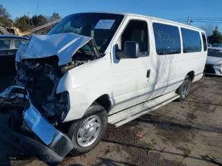 2010 Ford Econoline Wagon XL with VIN 1FBSS3BLXADA00923, listed as a IAAI auction lot 41327434 with 229,175 mi miles. Bid and sale history available at carsss.com. Image 2.