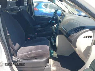 2014 Dodge Grand Caravan American Value with VIN 2C4RDGBG5ER187005, listed as a IAAI auction lot 42018333 with 216,149 mi miles and . Bid and sale history available at DreamBid. Image 5.