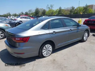 2019 Volkswagen Jetta S z VIN 3VWC57BUXKM074708, wystawiony jako IAAI lot #42151448 z przebiegiem 189 430 mil mil oraz . Historia ofert i sprzedaży dostępna na DreamBid. Obrazek 4.