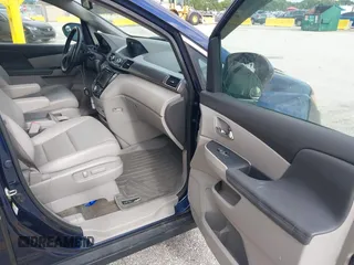 2016 Honda Odyssey EX-L with VIN 5FNRL5H60GB064815, listed as a IAAI auction lot 38644382 with 84,499 mi miles. Bid and sale history available at carsss.com. Image 5.