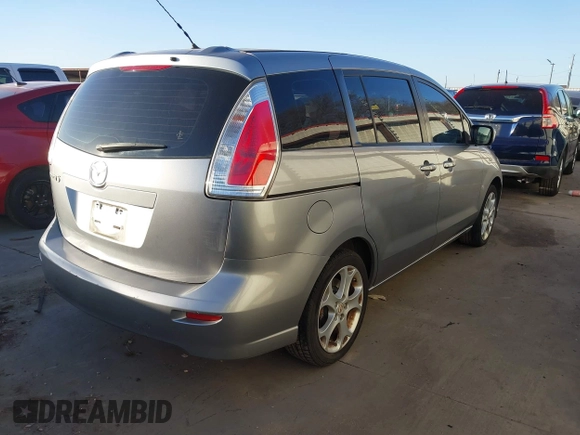 2010 Mazda 5 Sport z VIN JM1CR2W30A0384041, wystawiony jako IAAI lot #41134158 z przebiegiem 178 540 mil mil oraz . Historia ofert i sprzedaży dostępna na DreamBid. Obrazek 4.