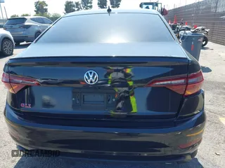 2019 Volkswagen Jetta GLI S z VIN 3VW6T7BU4KM255418, wystawiony jako IAAI lot #42141020 z przebiegiem 74 066 mil mil oraz . Historia ofert i sprzedaży dostępna na DreamBid. Obrazek 16.