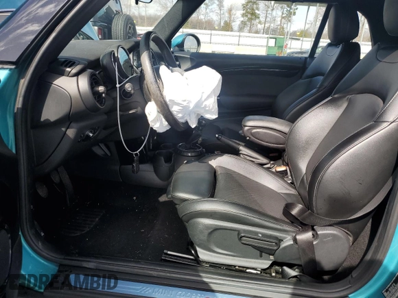 2016 MINI Convertible S with VIN WMWWG9C59G3A92347, listed as a Copart auction lot 47449015 with 79,860 mi miles and Salvage Title. Bid and sale history available at DreamBid. Image 7.