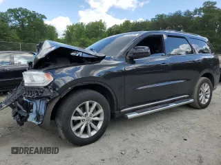 2014 Dodge Durango SXT with VIN 1C4RDJAGXEC301247, listed as a Copart auction lot 57979235 with 153,671 mi miles and Salvage title. Bid and sale history available at DreamBid. Image 1.