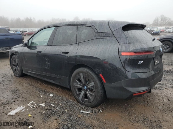 2022 BMW iX xDrive50 with VIN WB523CF06NCJ58191, listed as a Copart auction lot 84034634 with 0 mi miles and Salvage Title. Bid and sale history available at carsss.com. Image 2.