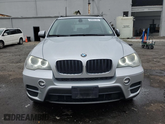 2012 BMW X5 35i with VIN 5UXZV4C57CL747717, listed as a Copart auction lot 63003135 with 135,999 mi miles and Clean title. Bid and sale history available at DreamBid. Image 5.