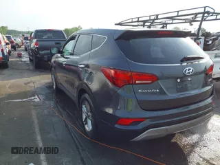 2018 Hyundai Santa Fe 2.4L with VIN 5XYZT3LB0JG525150, listed as a IAAI auction lot 42070377 with 142,418 mi miles and . Bid and sale history available at DreamBid. Image 3.