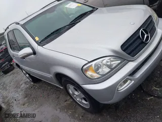 2002 Mercedes-Benz M-Class with VIN 4JGAB54E92A352889, listed as a IAAI auction lot 41805001 with 174,758 mi miles. Bid and sale history available at carsss.com. Image 1.