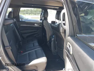 2017 Jeep Grand Cherokee Overland with VIN 1C4RJFCG2HC641791, listed as a IAAI auction lot 42566654 with 116,764 mi miles and . Bid and sale history available at DreamBid. Image 8.