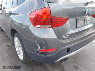 2014 BMW X1 sDrive28i with VIN WBAVM1C52EVW56134, listed as a IAAI auction lot 41941829 with 85,839 mi miles. Bid and sale history available at carsss.com. Image 6.