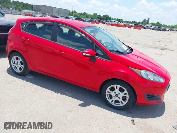 2015 Ford Fiesta SE z VIN 3FADP4EJ4FM166653, wystawiony jako IAAI lot #42410322 z przebiegiem 141 305 mil mil oraz . Historia ofert i sprzedaży dostępna na DreamBid. Obrazek 1.