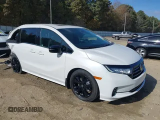 2023 Honda Odyssey Sport z VIN 5FNRL6H70PB050945, wystawiony jako IAAI lot #40716046 z przebiegiem 14 192 mil mil oraz . Historia ofert i sprzedaży dostępna na DreamBid. Obrazek 1.