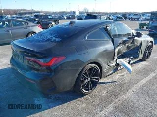 2021 BMW 4 Series M440i xDrive with VIN WBA13AR0XMCF50380, listed as a IAAI auction lot 41200404 with 26,102 mi miles and . Bid and sale history available at DreamBid. Image 6.