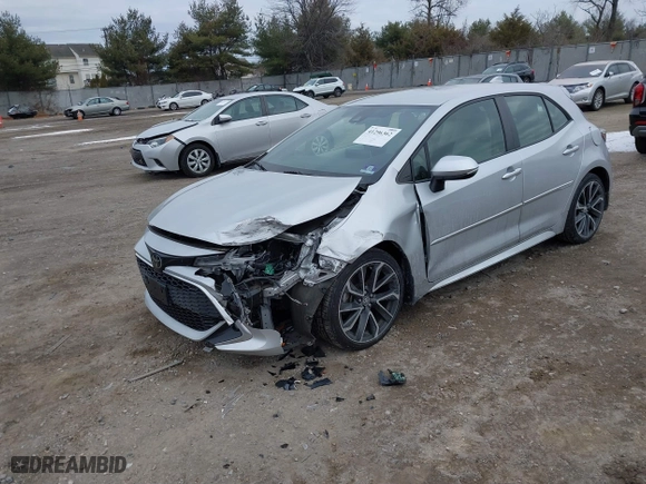 2019 Toyota Corolla Hatchback SE with VIN JTNK4RBE6K3064695, listed as a IAAI auction lot 41296362 with 56,282 mi miles. Bid and sale history available at carsss.com. Image 22.