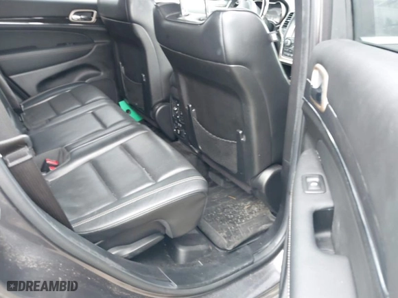 2014 Jeep Grand Cherokee Overland with VIN 1C4RJFCM7EC427204, listed as a IAAI auction lot 41934698 with 147,131 mi miles. Bid and sale history available at carsss.com. Image 8.